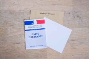 Marseille, France - 7 Mai 2017- Elections Presidential and Legislative / French electoral card recto view isolated on white. This paper is required to vote in France. It is issued by the Ministry of Internal Affairs when you pass the age of 18 years.